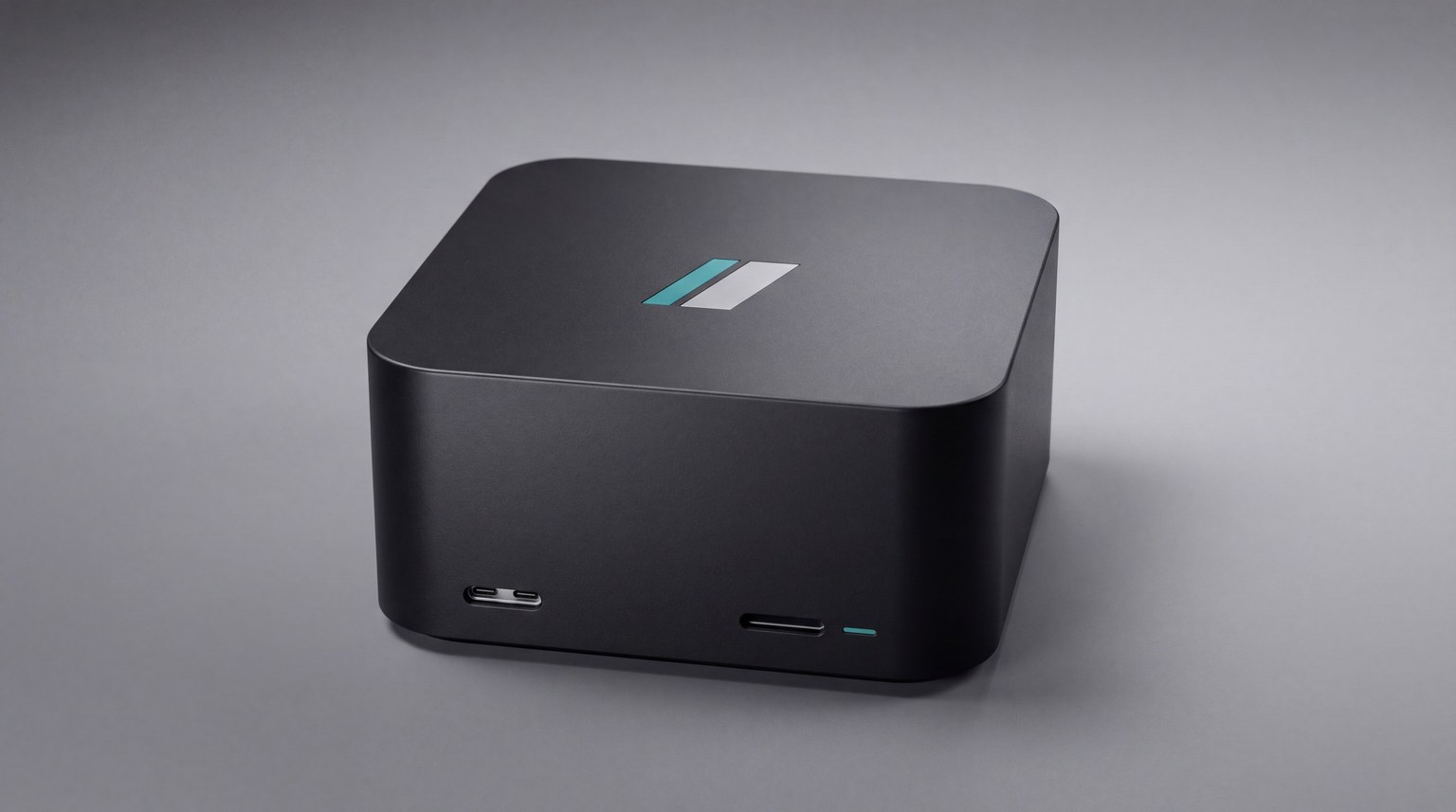The larger satin-black razorBridge Outpost Blade with front ports, a card slot and a thin teal status light.